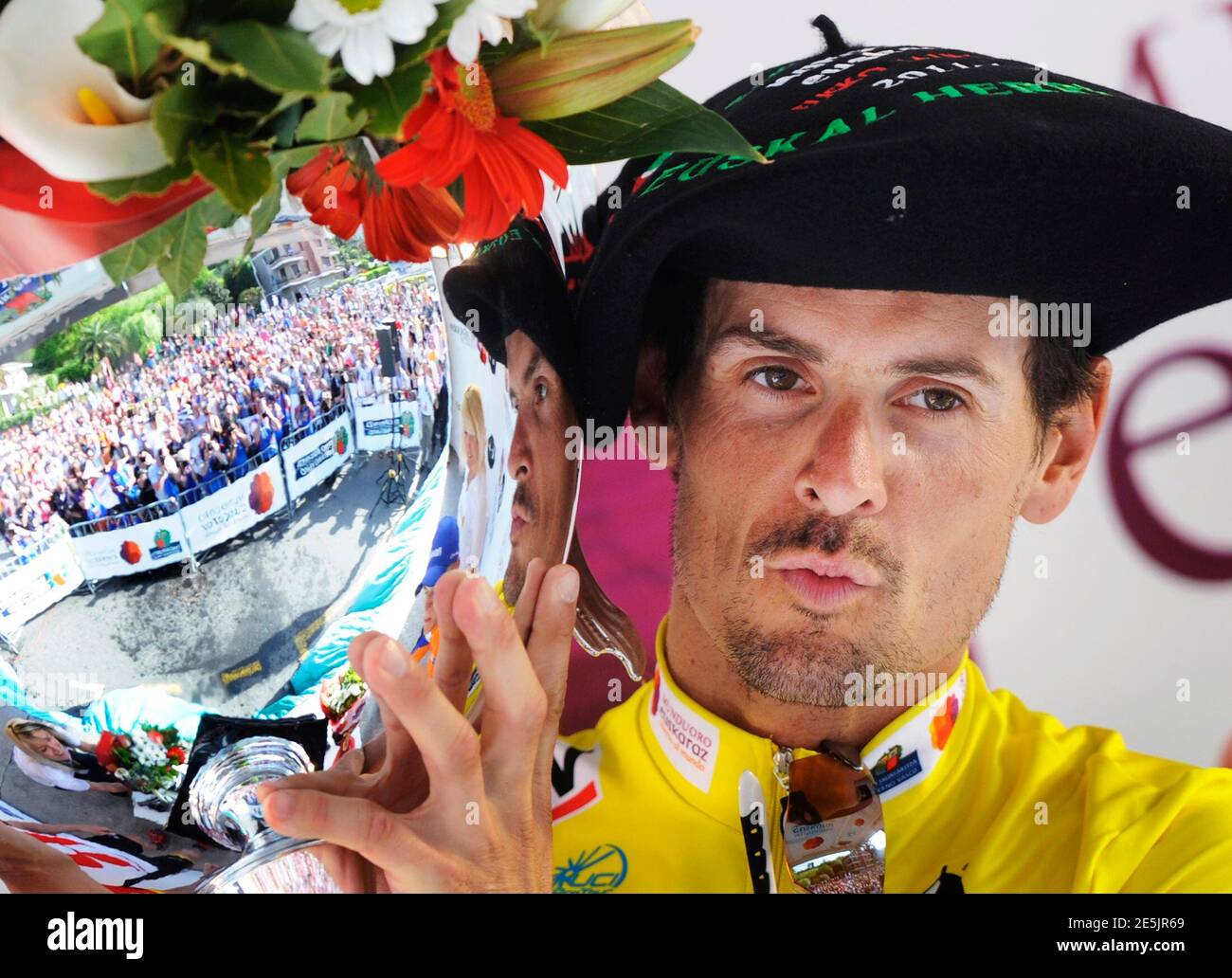 radioshack-rider-andreas-kloden-of-germany-celebrates-on-the-podium-after-winning-the-six-day-tour-of-the-basque-country-cycling-race-in-zalla-april-9-2011-kloden-won-the-uci-world-tour-event-with-an-47-second-lead-over-second-placed-radioshack-rider-christopher-horner-of-the-us-and-third-placed-rabobank-rider-robert-gesink-of-the-netherlands-reutersvincent-west-spain-tags-sport-cycling-2E5JR69.jpg