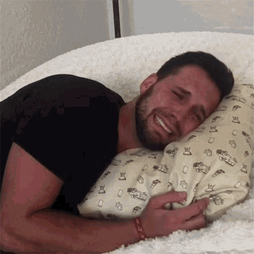 crying-hugging-pillow.gif