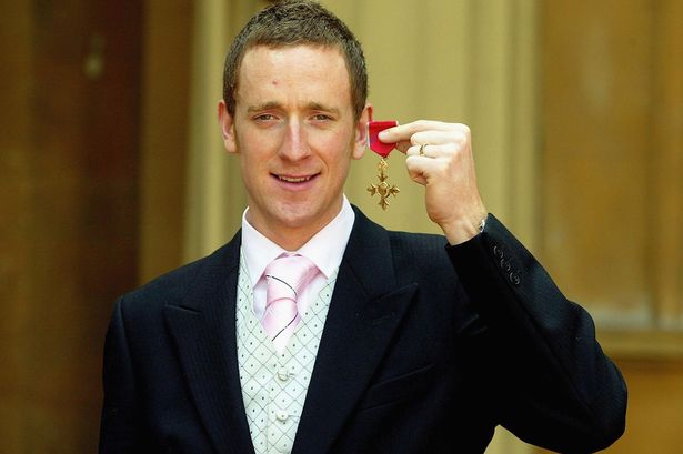 Olympic+medal-winning+cyclist+Bradley+Wiggins,+after+receiving+his+OBE+from+the+Queen+at+today's+Buckingham+Palace+investitur