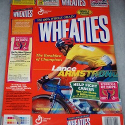 Lance-Armstrong-with-banner-250x250.jpg