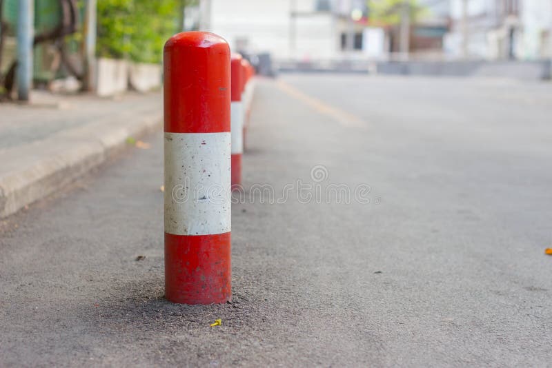 road-block-pole-straight-line-65675111.jpg