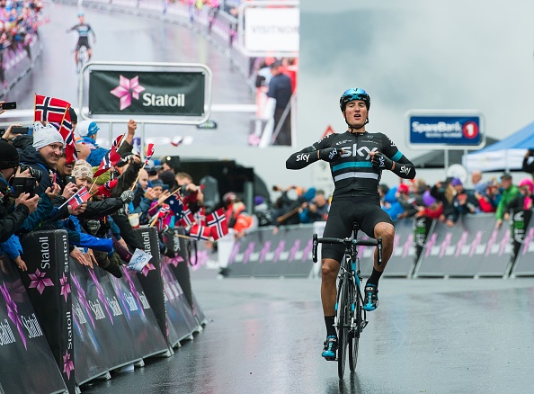 italian-gianni-moscon-of-team-sky-celebrates-as-he-crosses-the-finish-picture-id589077818