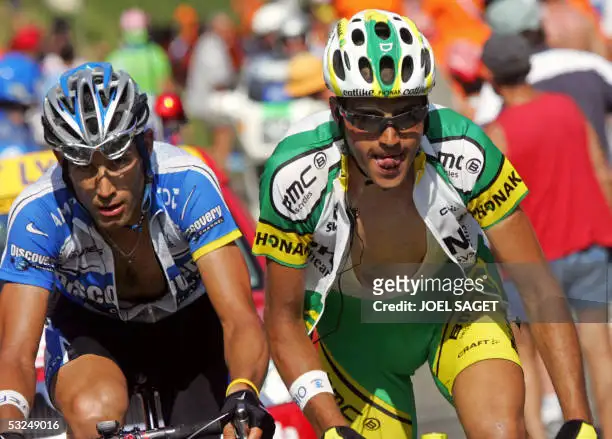 us-geroge-hincapie-and-spaniard-oscar-pereiro-ride-uphill-during-the-15th-stage-of-the-92nd-tour.webp
